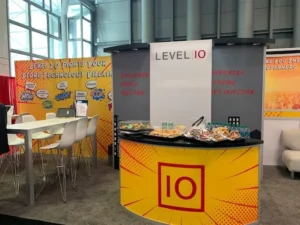 Professional installation of custom SEG fabric graphics for a booth at McCormick Place convention center