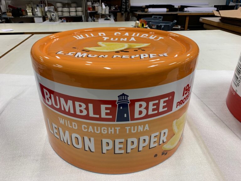 Large cylindrical Bumble Bee Tuna prop wrapped with high-resolution printed 3M vinyl graphics for advertising and film production.