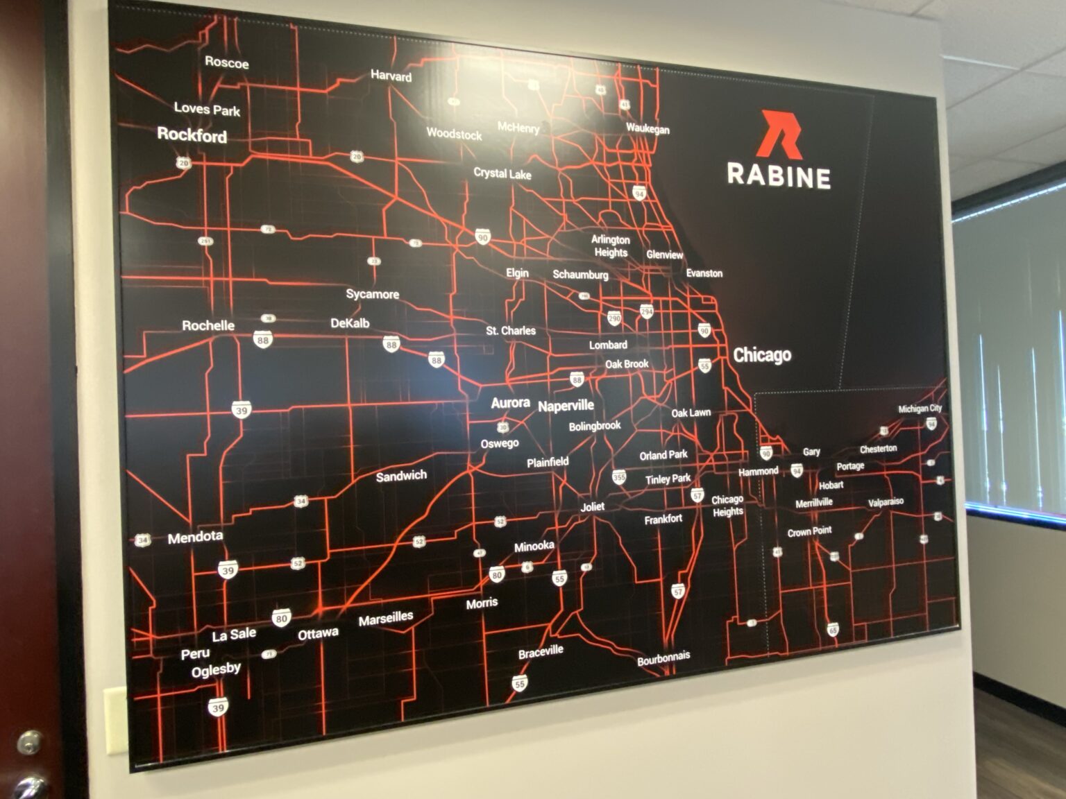 Custom printed wall covering in a corporate office lobby,