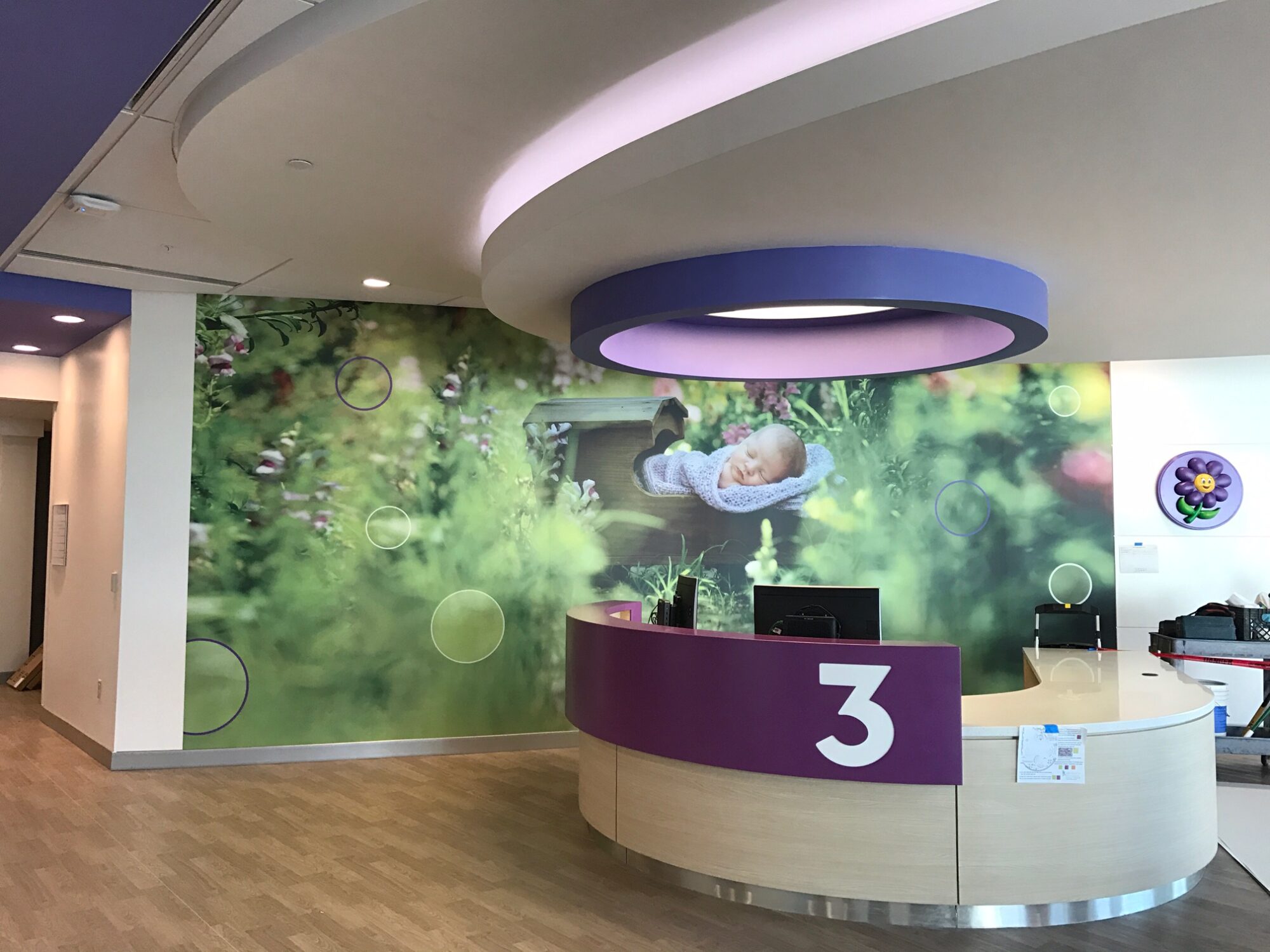 "Custom printed wall covering in a corporate office lobby
