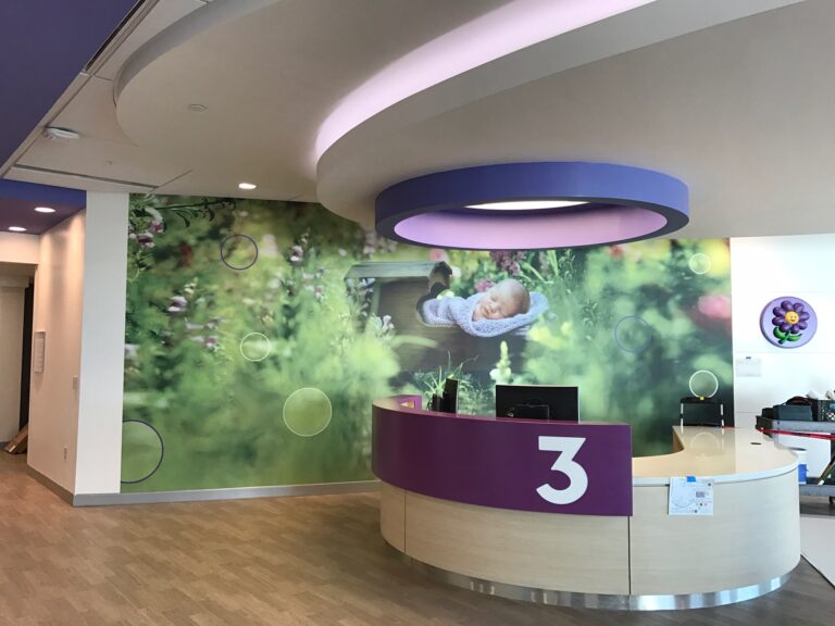 "Custom printed wall covering in a corporate office lobby