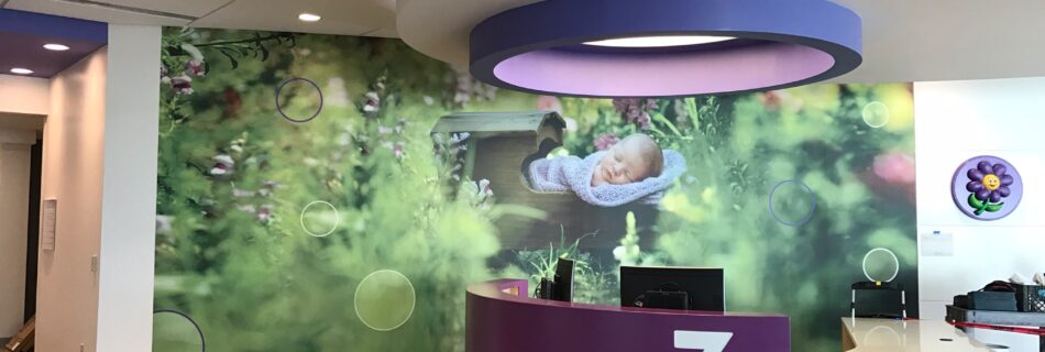 "Custom printed wall covering in a corporate office lobby