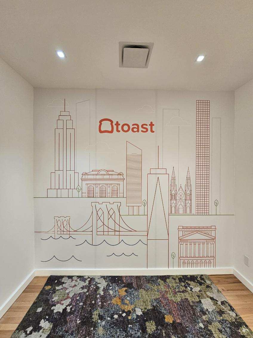 Branded hallway timeline mural